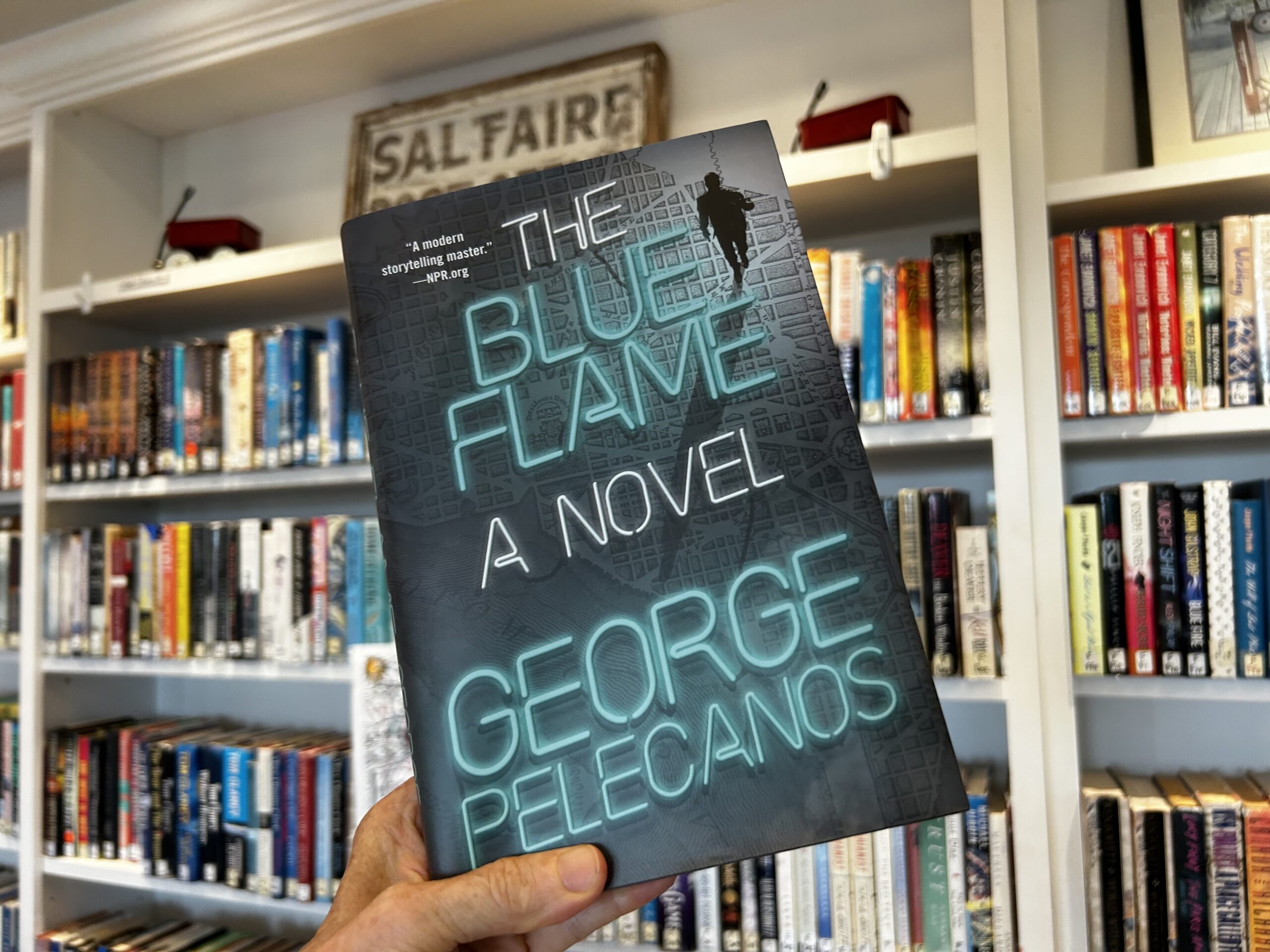 Cover of George Pelecanos's book "The Blue Flame" at the Saltaire Library, Fire Island, New York